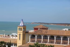 Vistas del Faro desde Apartamento Atalaya - Apartamentos Patio Andaluz - Playa de La Fontanilla (Conil)