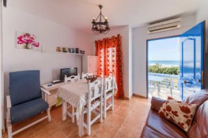 Apartamento Huerto - Salón - Apartamentos Patio Andaluz - Playa de La Fontanilla (Conil)