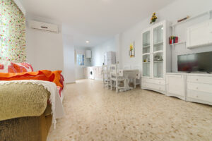 Apartamento Baluarte - Salón - Apartamentos Patio Andaluz - Playa de La Fontanilla (Conil)